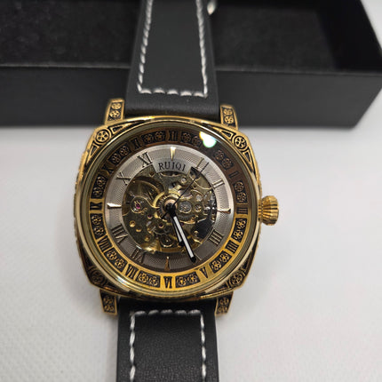 RUIQI Luxury Skeleton Automatic Watch – Gold Engraved Case & Black Leather Strap (3ATM Water Resistant)