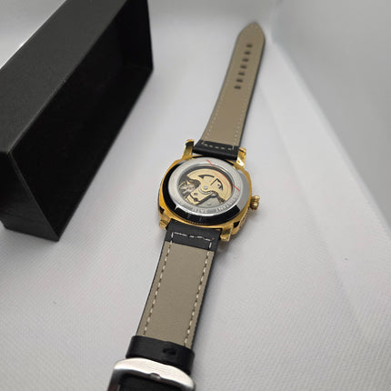 RUIQI Luxury Skeleton Automatic Watch – Gold Engraved Case & Black Leather Strap (3ATM Water Resistant)