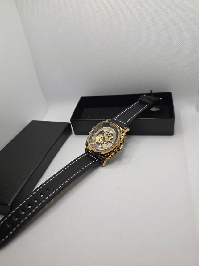 RUIQI Luxury Skeleton Automatic Watch – Gold Engraved Case & Black Leather Strap (3ATM Water Resistant)